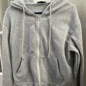 One Shein zip hoodie and one American Eagle crop sweatshirt